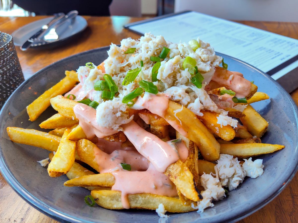 crab topped fries paddlefish october 2023 Pirates & Princesses